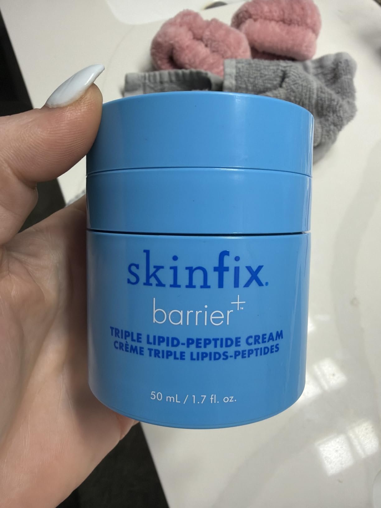 Blue jar of Skinfix Barrier Plus Triple Lipid-Peptide Cream