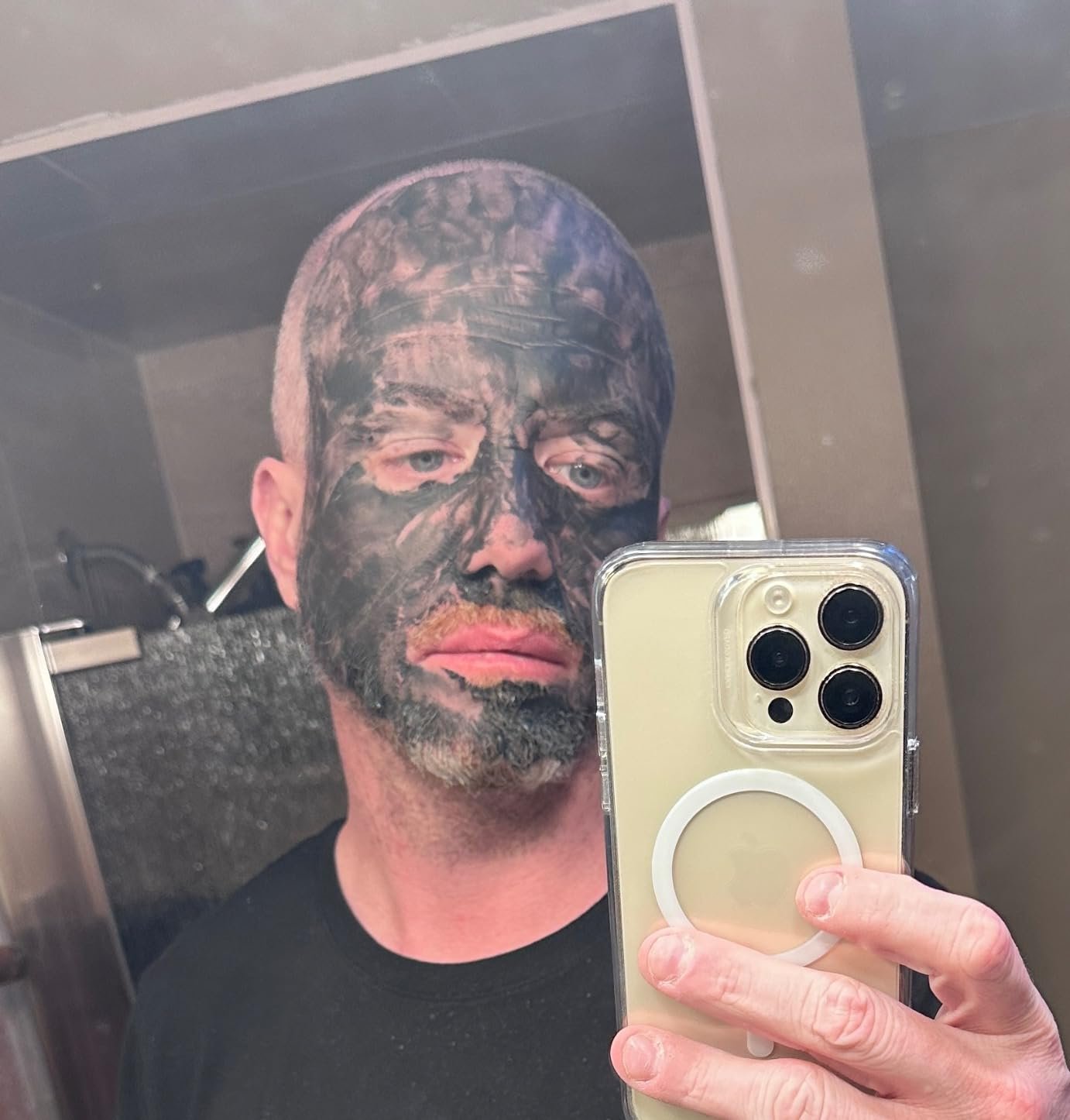 Customer wearing a dark charcoal face mask