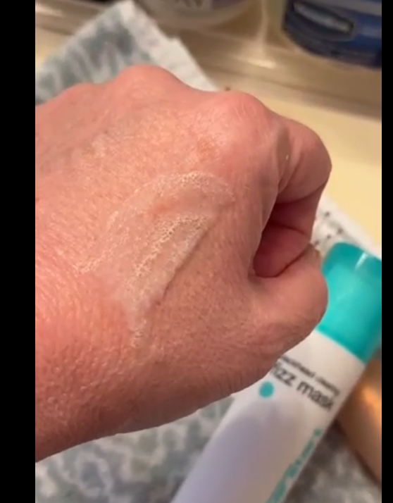 Dermalogica Clear Start Fizz Mask bubbling texture on the back of a hand