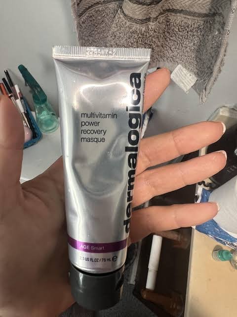 Dermalogica MultiVitamin Power Recovery Masque tube held in hand