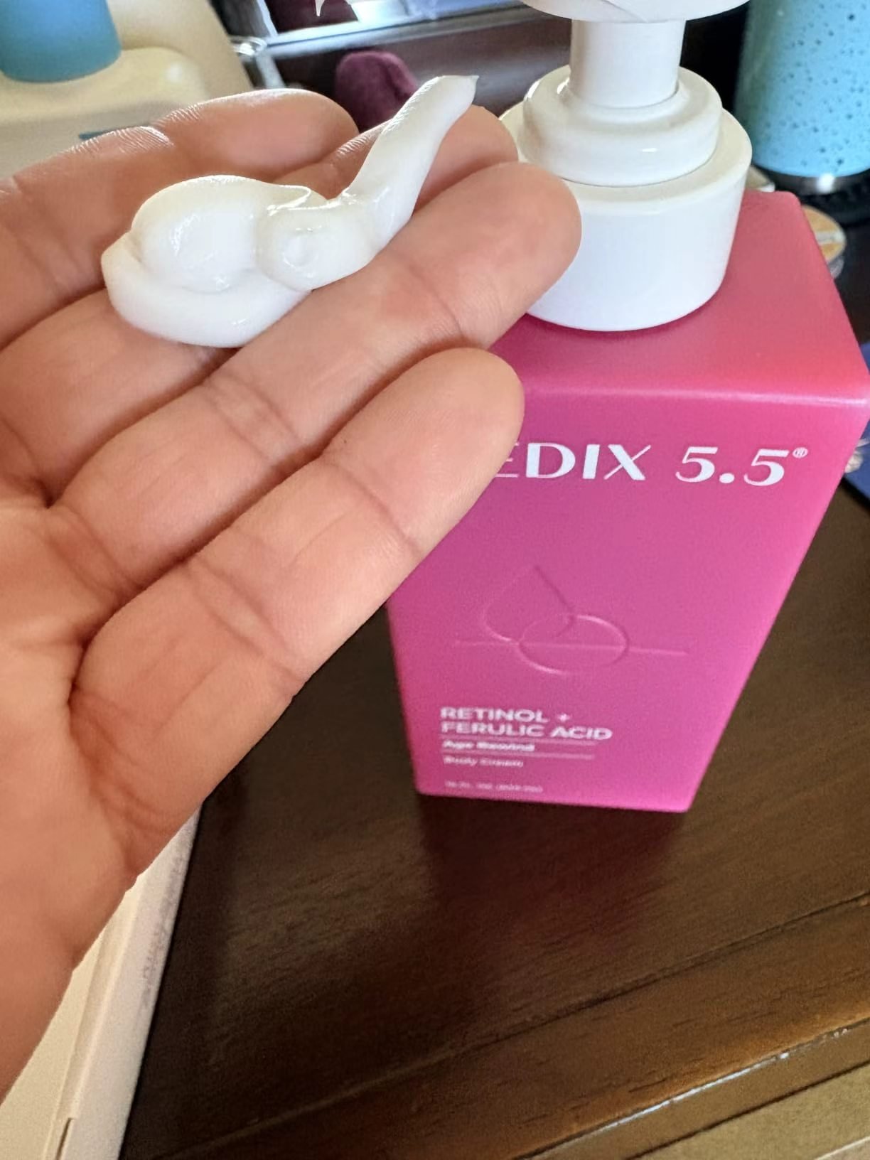 White Medix 5.5 body cream texture dispensed onto fingers
